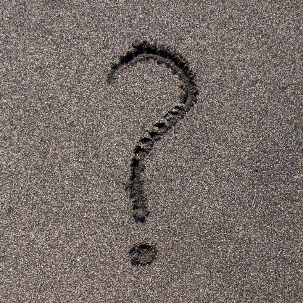 question mark in the sand